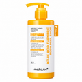 A bottle of Medicube Kojic Acid Turmeric Body Peel Shot with a yellow pump dispenser and a white label featuring orange and black text, set against a plain white background.