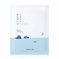 A single-use skincare packet for Round Lab's 1025 Water Gel mask, featuring a minimalist illustration of rocks and a seal in a light blue ocean on a white and light blue background.