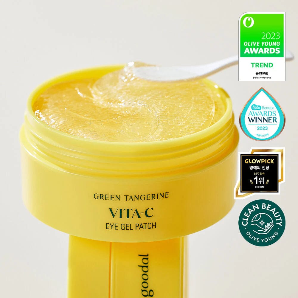 Yellow jar of Vita-C eye gel patch with Goodal branding and awards on a light gray background