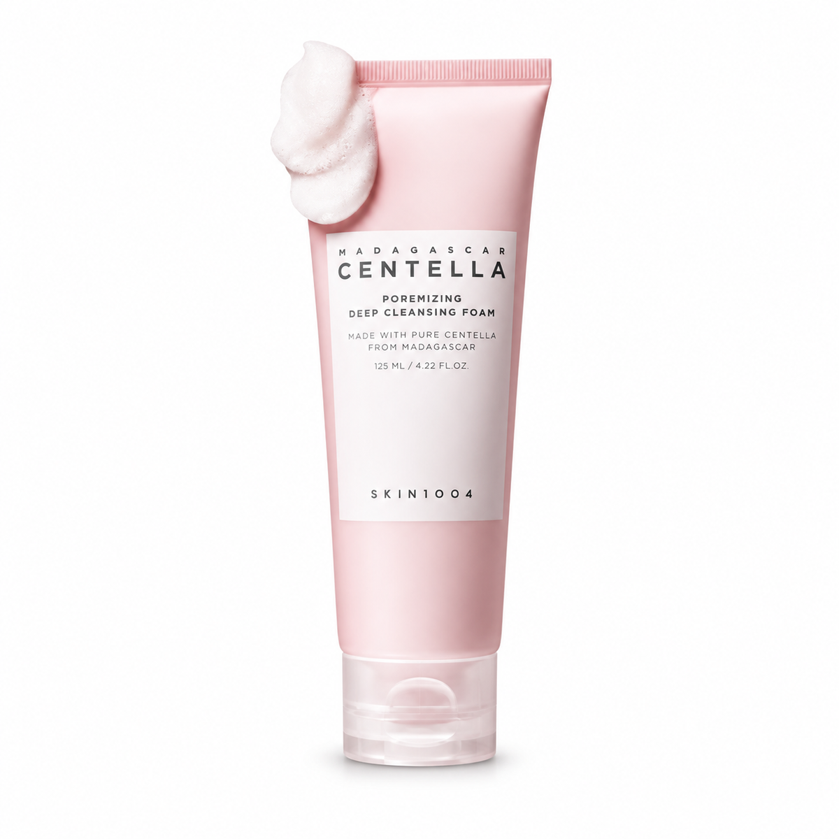 A pink squeeze tube of SKIN1004 Madagascar Centella Poremizing Deep Cleansing Foam with a white foam swirl on top, set against a plain white background.
