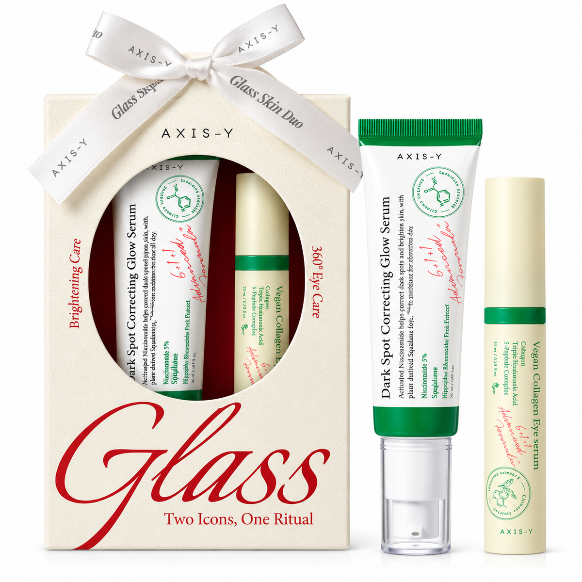 AXIS-Y Glass skincare gift set featuring a cream-colored gift box with a white ribbon, a tube of Dark Spot Correcting Glow Serum, a tube of Brightening Care Glow Serum, and a tube of Vitamin Cellulose Cream, all on a white background.
