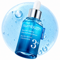 Numbuzin Blue Bio-Retinol Pore Refining Serum in a blue glass dropper bottle, set against a circular blue liquid background with water droplets.